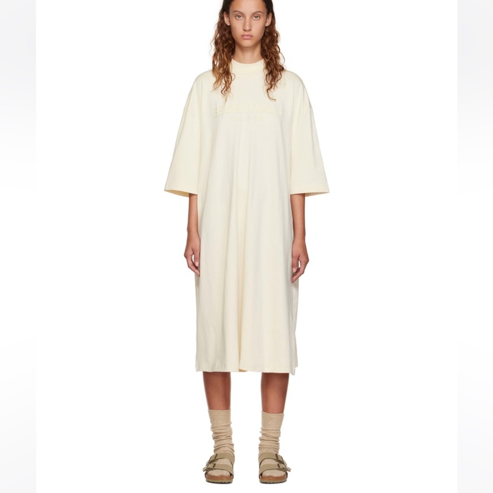 Cotton cowl neck dress with pockets.